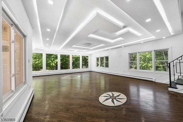 47 Cutlass Rd, Kinnelon Boro, NJ 07405 - unfurnished living room with stairs, a baseboard heating unit, wood finished floors, recessed lighting, and a baseboard radiator