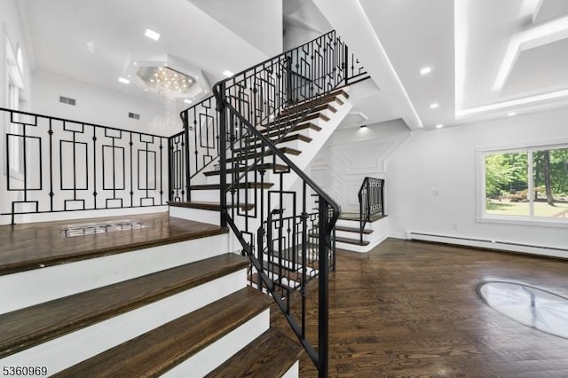 47 Cutlass Rd, Kinnelon Boro, NJ 07405 - staircase featuring a baseboard radiator, wood finished floors, recessed lighting, a chandelier, and baseboards