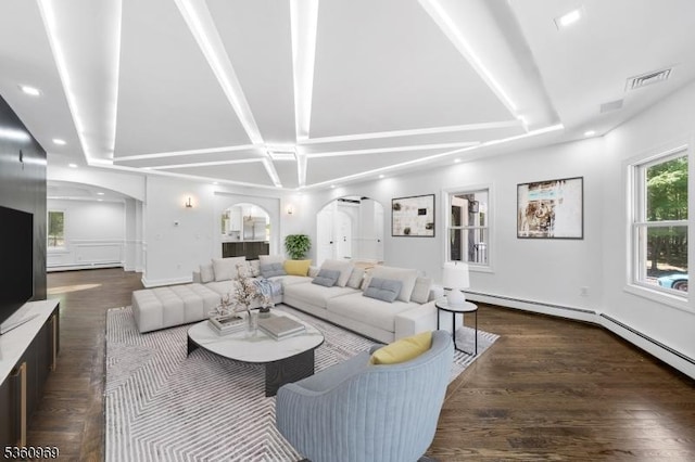 47 Cutlass Rd, Kinnelon Boro, NJ 07405 - living room with arched walkways, recessed lighting, and wood finished floors