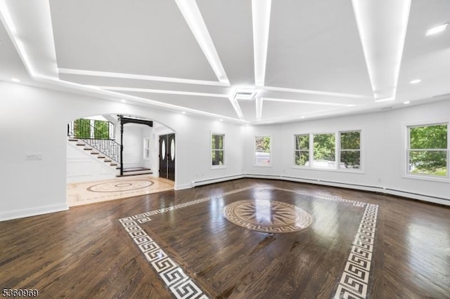 47 Cutlass Rd, Kinnelon Boro, NJ 07405 - unfurnished living room featuring arched walkways, stairs, wood finished floors, baseboards, and recessed lighting