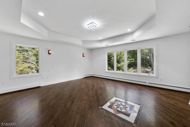 47 Cutlass Rd, Kinnelon Boro, NJ 07405 - spare room with a raised ceiling, baseboard heating, wood finished floors, recessed lighting, and a baseboard heating unit