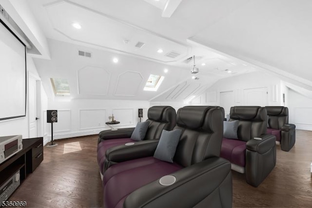 47 Cutlass Rd, Kinnelon Boro, NJ 07405 - cinema with lofted ceiling, a decorative wall, and dark wood-style flooring
