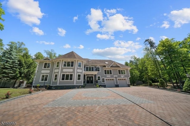 47 Cutlass Rd, Kinnelon Boro, NJ 07405 - view of front of house with an attached garage and driveway