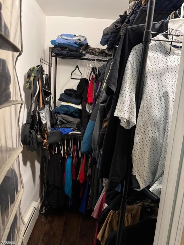 41-43 N 11th St, Paterson City, NJ 07522 - spacious closet with wood finished floors and a baseboard heating unit