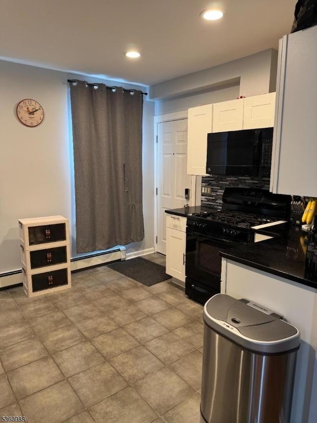 41-43 N 11th St, Paterson City, NJ 07522 - kitchen featuring black appliances, white cabinets, a baseboard radiator, dark countertops, and decorative backsplash