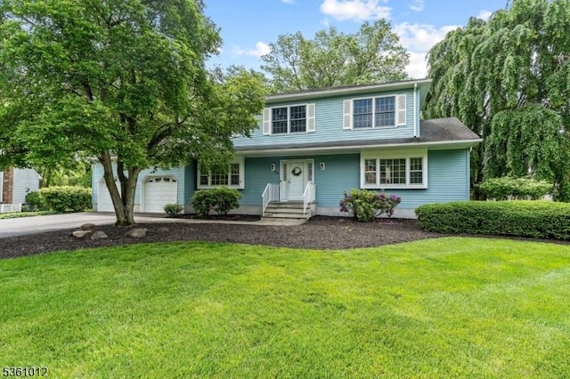 25 Shannon Rd, Bridgewater Twp, NJ 08807 - view of front facade with a front lawn, driveway, and an attached garage
