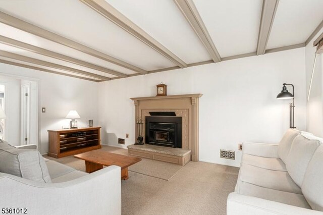 25 Shannon Rd, Bridgewater Twp, NJ 08807 - carpeted living area with beam ceiling and a glass covered fireplace