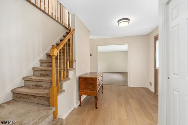 25 Shannon Rd, Bridgewater Twp, NJ 08807 - stairway with wood finished floors and baseboards