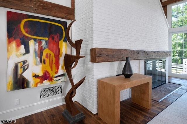 563 Cherry Valley Rd, Montgomery Twp, NJ 08540 - detailed view of wood finished floors and brick wall
