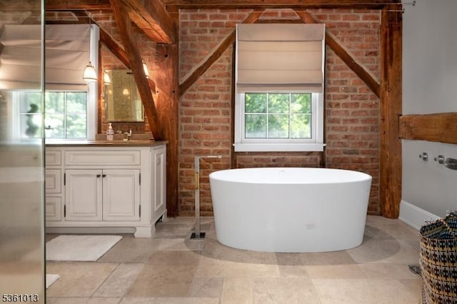 563 Cherry Valley Rd, Montgomery Twp, NJ 08540 - full bathroom with vanity, a soaking tub, and brick wall