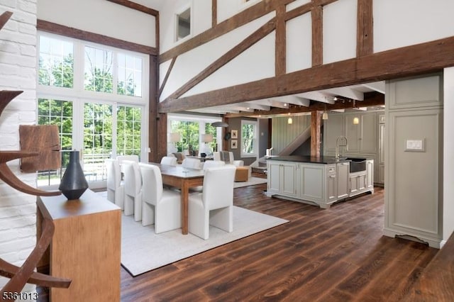 563 Cherry Valley Rd, Montgomery Twp, NJ 08540 - dining room featuring high vaulted ceiling, beamed ceiling, and dark wood-style flooring
