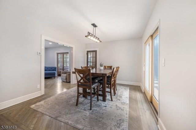 1038 Sherman Ave, Plainfield City, NJ 07063 - dining space with baseboards and wood finished floors