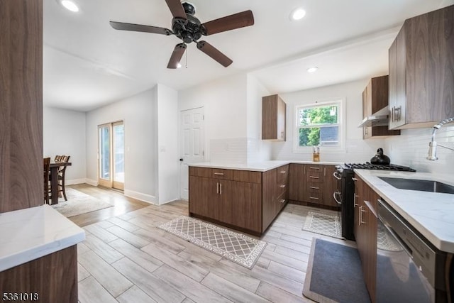 1038 Sherman Ave, Plainfield City, NJ 07063 - kitchen featuring stainless steel dishwasher, a sink, ventilation hood, range with gas cooktop, and decorative backsplash