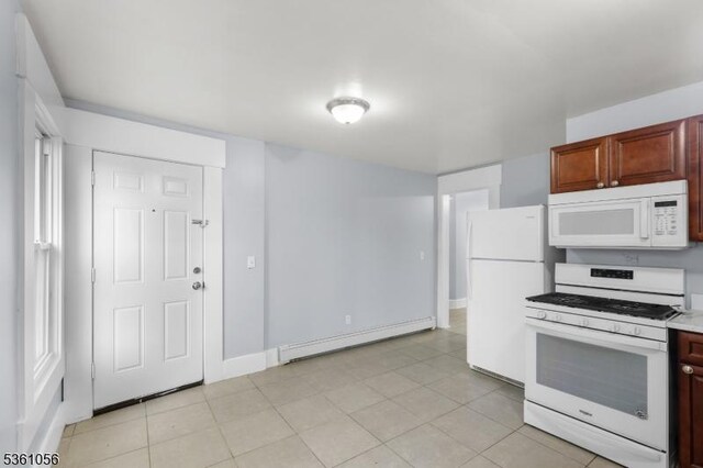 489 Conover Ter, City Of Orange Twp, NJ 07050 - kitchen with white appliances, a baseboard radiator, light countertops, and baseboards