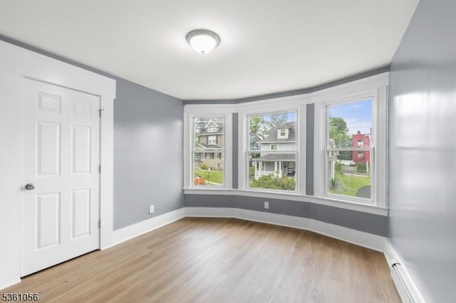 489 Conover Ter, City Of Orange Twp, NJ 07050 - unfurnished room with wood finished floors and baseboards