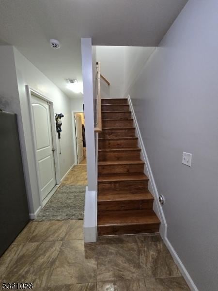 648 Marshall St, Elizabeth City, NJ 07206 - stairs with baseboards