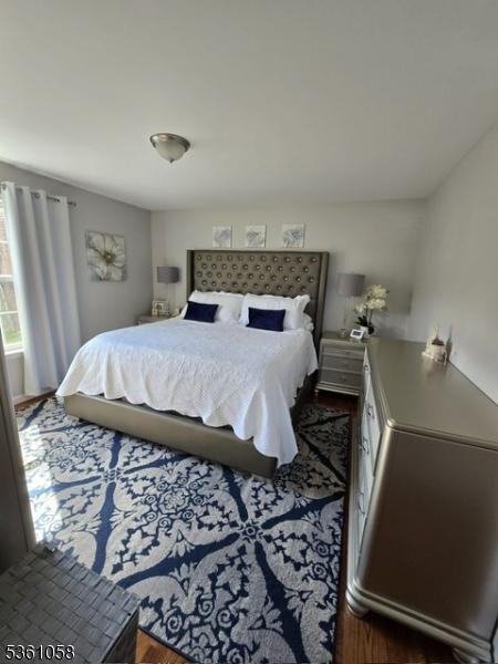 648 Marshall St, Elizabeth City, NJ 07206 - bedroom with wood finished floors