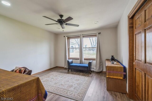 30 Claridge Ln, Raritan Twp, NJ 08822 - bedroom with wood finished floors, recessed lighting, ceiling fan, and baseboards