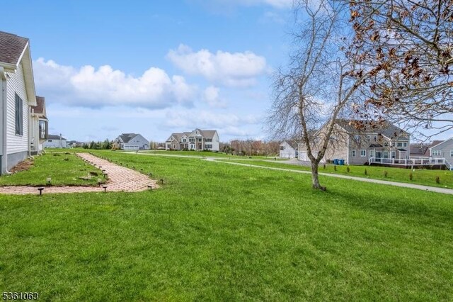 30 Claridge Ln, Raritan Twp, NJ 08822 - view of green lawn featuring a residential view