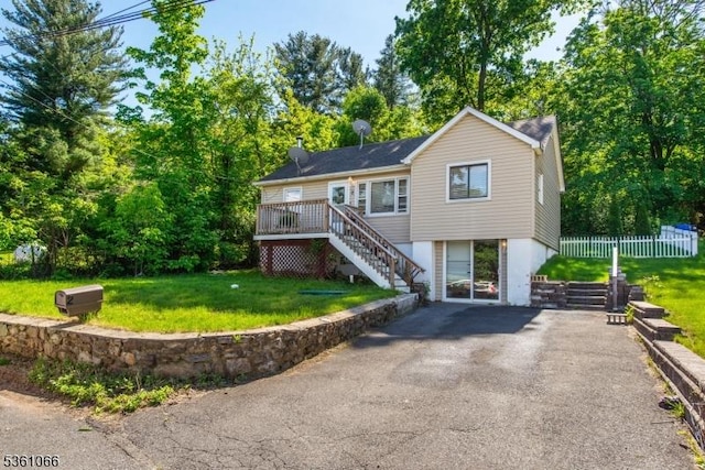 2 Shore Rd, Jefferson Twp, NJ 07849 - view of front of home with stairway, a wooden deck, and asphalt driveway