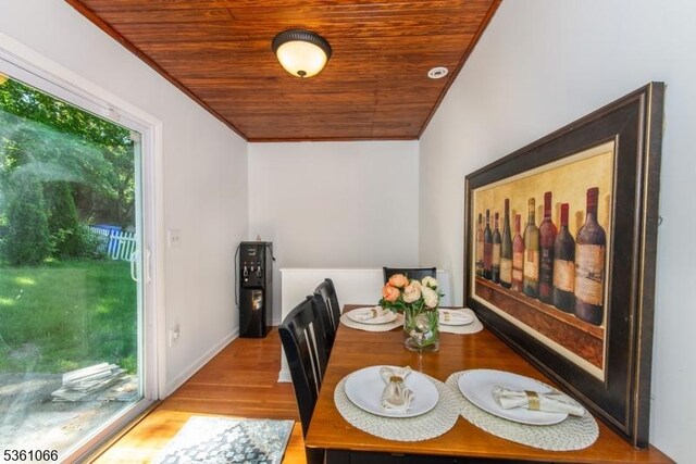 2 Shore Rd, Jefferson Twp, NJ 07849 - dining area featuring wooden ceiling, wood finished floors, and baseboards