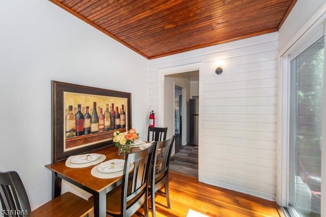 2 Shore Rd, Jefferson Twp, NJ 07849 - dining space featuring wooden ceiling, crown molding, wood finished floors, and wood walls