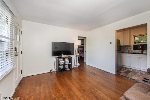 2 Shore Rd, Jefferson Twp, NJ 07849 - living room with dark wood-type flooring and baseboards