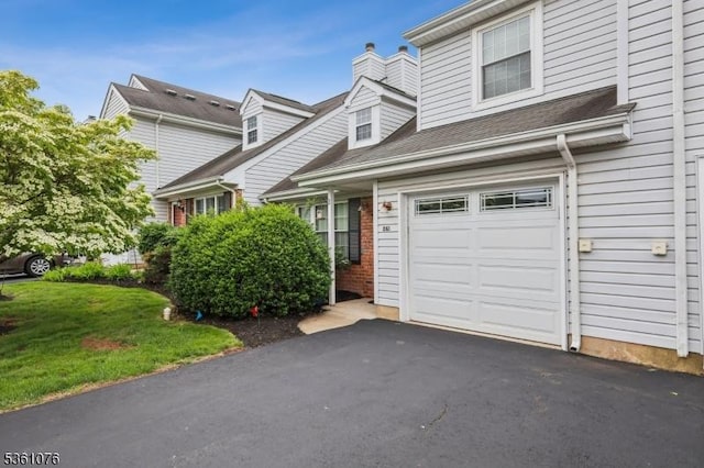 261 Bloomsbury Ct, Franklin Twp, NJ 08873 - townhome / multi-family property featuring an attached garage and a chimney
