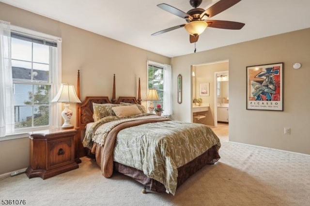 261 Bloomsbury Ct, Franklin Twp, NJ 08873 - bedroom with light colored carpet, ensuite bath, and ceiling fan