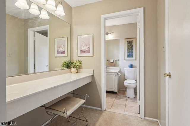 261 Bloomsbury Ct, Franklin Twp, NJ 08873 - bathroom with vanity, toilet, baseboards, and tile patterned floors