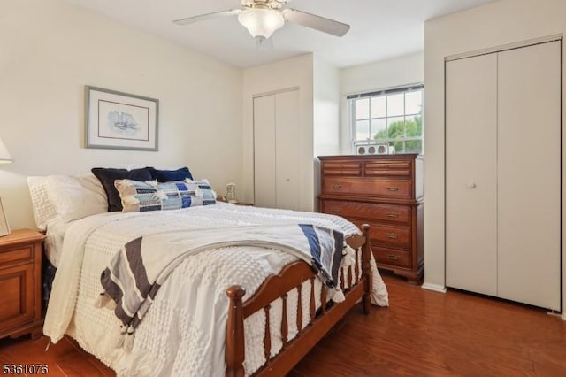 261 Bloomsbury Ct, Franklin Twp, NJ 08873 - bedroom with two closets, dark wood-style floors, and a ceiling fan