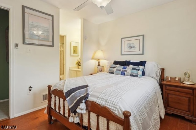 261 Bloomsbury Ct, Franklin Twp, NJ 08873 - bedroom with wood finished floors, baseboards, connected bathroom, and ceiling fan