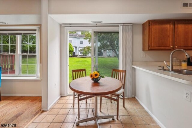 261 Bloomsbury Ct, Franklin Twp, NJ 08873 - dining room featuring baseboards and light tile patterned floors