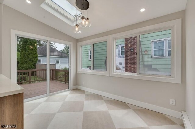 1535 Leslie St, Hillside Twp, NJ 07205 - unfurnished sunroom with a skylight, a baseboard radiator, and vaulted ceiling