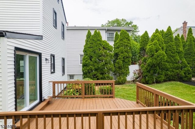1535 Leslie St, Hillside Twp, NJ 07205 - wooden deck featuring a yard