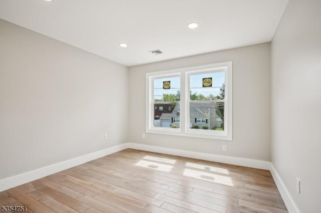 223 Victor St, Scotch Plains Twp, NJ 07076 - unfurnished room with baseboards, light wood-style floors, and recessed lighting