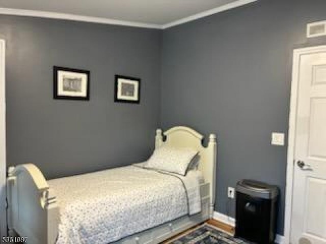 512 Kenbury Rd, Branchburg Twp, NJ 08876 - bedroom featuring ornamental molding