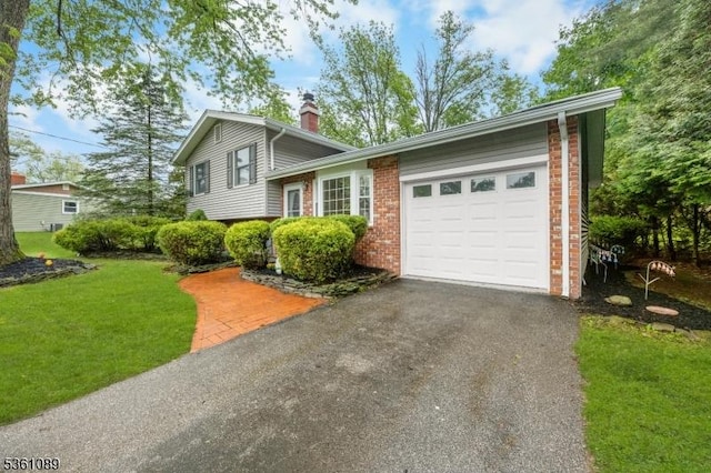 62 Valley View Rd, High Bridge Boro, NJ 08829 - split level home with a garage, a chimney, brick siding, asphalt driveway, and a front lawn