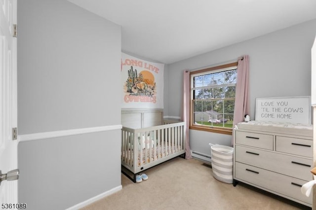 62 Valley View Rd, High Bridge Boro, NJ 08829 - bedroom with light colored carpet, a nursery area, a baseboard heating unit, and baseboards