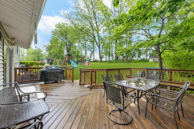 62 Valley View Rd, High Bridge Boro, NJ 08829 - wooden deck with a grill, outdoor dining area, a lawn, and a playground