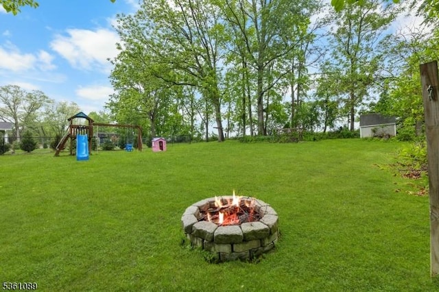 62 Valley View Rd, High Bridge Boro, NJ 08829 - view of yard with a playground and an outdoor fire pit