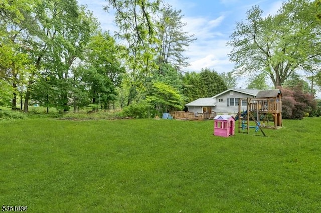 62 Valley View Rd, High Bridge Boro, NJ 08829 - view of grassy yard featuring a playground and a wooden deck