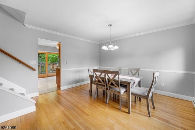 62 Valley View Rd, High Bridge Boro, NJ 08829 - dining room featuring crown molding, light wood-style flooring, stairs, baseboards, and a chandelier