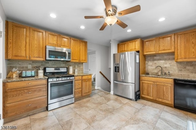 62 Valley View Rd, High Bridge Boro, NJ 08829 - kitchen featuring appliances with stainless steel finishes, a sink, backsplash, light stone counters, and recessed lighting