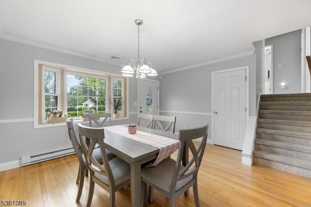 62 Valley View Rd, High Bridge Boro, NJ 08829 - dining room with a baseboard heating unit, a chandelier, crown molding, stairway, and light wood finished floors