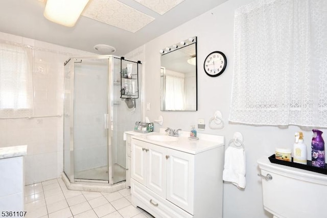 328 Hoover Ave, Bloomfield Twp, NJ 07003 - full bathroom featuring a stall shower, vanity, and tile patterned floors