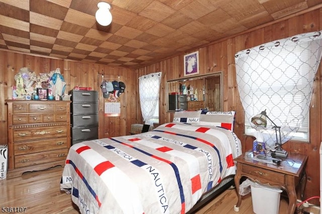 328 Hoover Ave, Bloomfield Twp, NJ 07003 - bedroom with wooden walls and wood finished floors