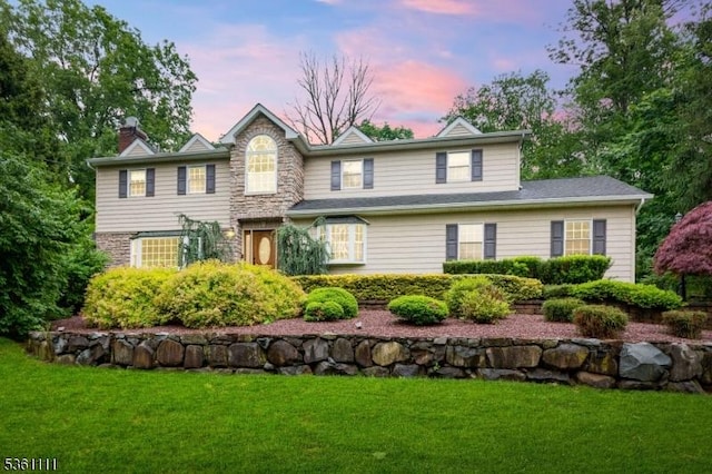 28 Sherbrook Dr, Berkeley Heights Twp, NJ 07922 - traditional-style home featuring a front lawn and a chimney