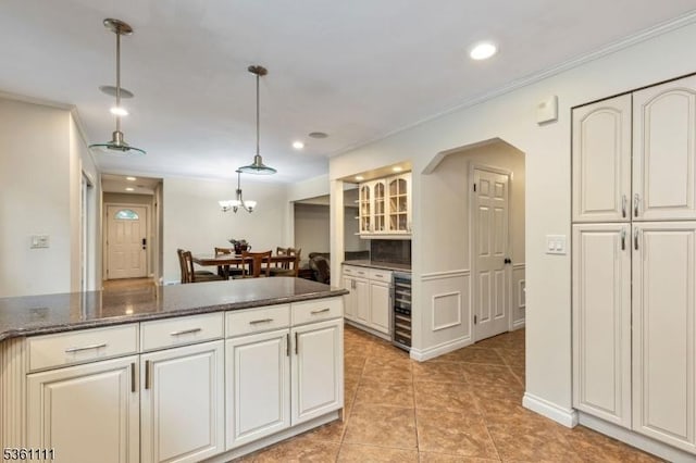 28 Sherbrook Dr, Berkeley Heights Twp, NJ 07922 - kitchen with beverage cooler, recessed lighting, light tile patterned flooring, glass insert cabinets, and pendant lighting