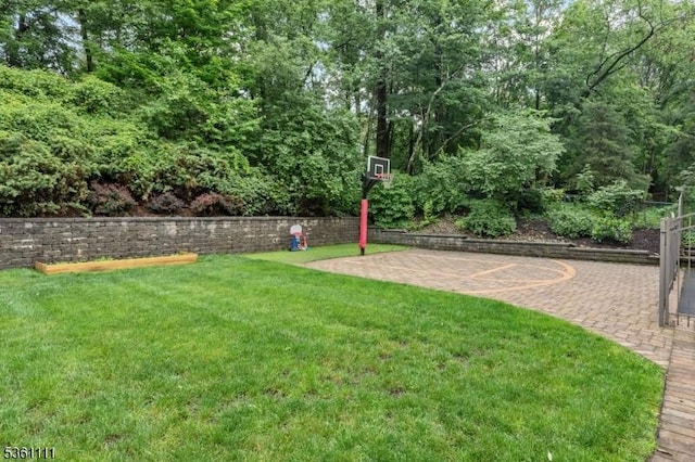 28 Sherbrook Dr, Berkeley Heights Twp, NJ 07922 - view of grassy yard with basketball court